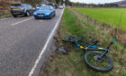 Police and ambulance teams were called to the scene of the incident on the A947 where a cyclist had been injured.