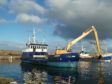 Selkie dredging at Buckie Harbour.