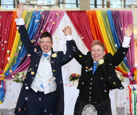 Couple Nydine Park and Joy McIntosh get married at Union Square shopping mall in Aberdeen in celebration of Grampian Pride. Picture by Simon Price/Firstpix