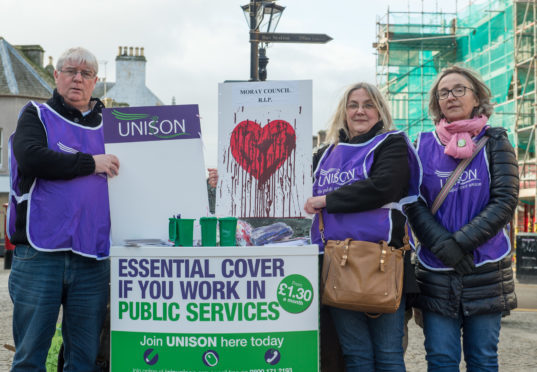 Moray Unison opposed cuts agreed at this year's budget. Pictured: member Tony Donaghey, branch secretary Suzanne Wright and member Eilidh Macleod.