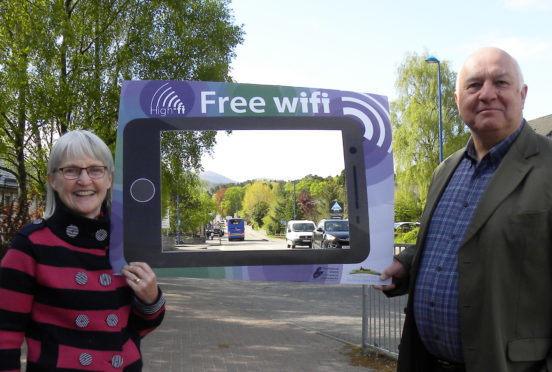 Councillor Muriel Cockburn and Councillor Bill Lobban gather as 'High-Fi' is rolled out in Aviemore