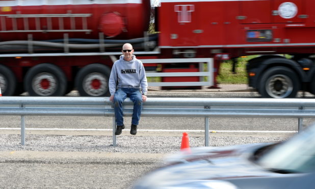 Stuart Addison, having problems crossing the A90 to get to the bus stop.