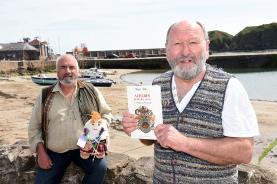 David Nicol, left and Phil Mills-Bishop of the twinning committee with gifts for the French town.
Picture by DARRELL BENNS