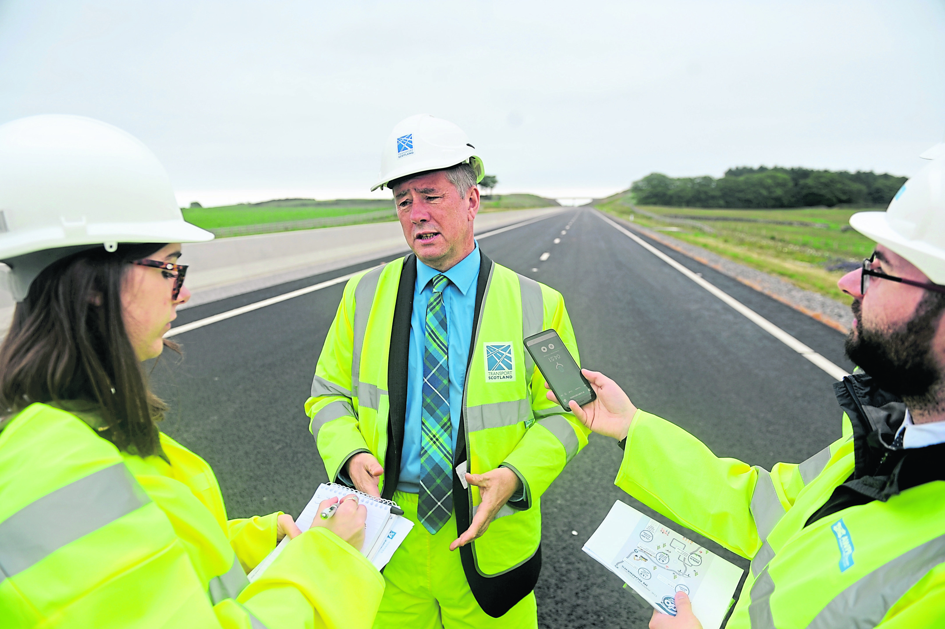Pictured is Keith Brown (Cabinet Secretary for Economy, Jobs and Fair Work) on a visit to the AWPR near Little Goval, Dyce, Aberdeen. 
Picture by Darrell Benns.