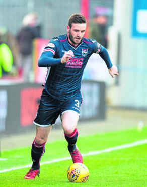 Jason Naismith in action for Ross County