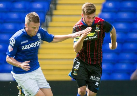 Stephen Gleeson takes on Graeme Shinnie in a pre-season friendly against Caley Thistle in 2014.