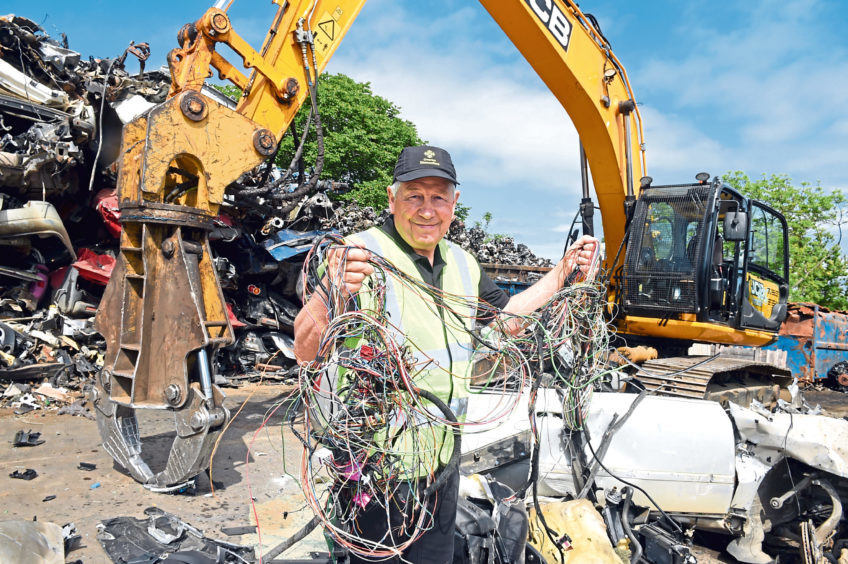 After 50 years at the helm of Overton Vehicle Dismantlers, Sandy Dalgarno will let someone new