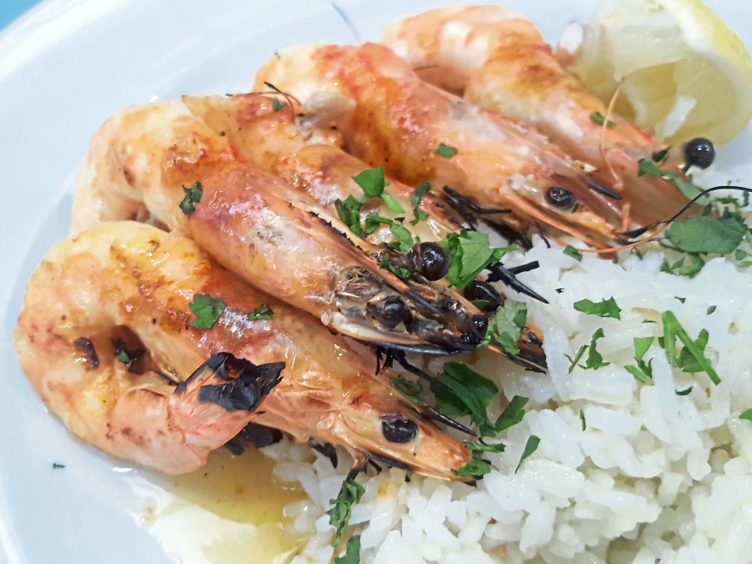 Enjoy some delicious grilled prawns at the Time Out Lisbon Market