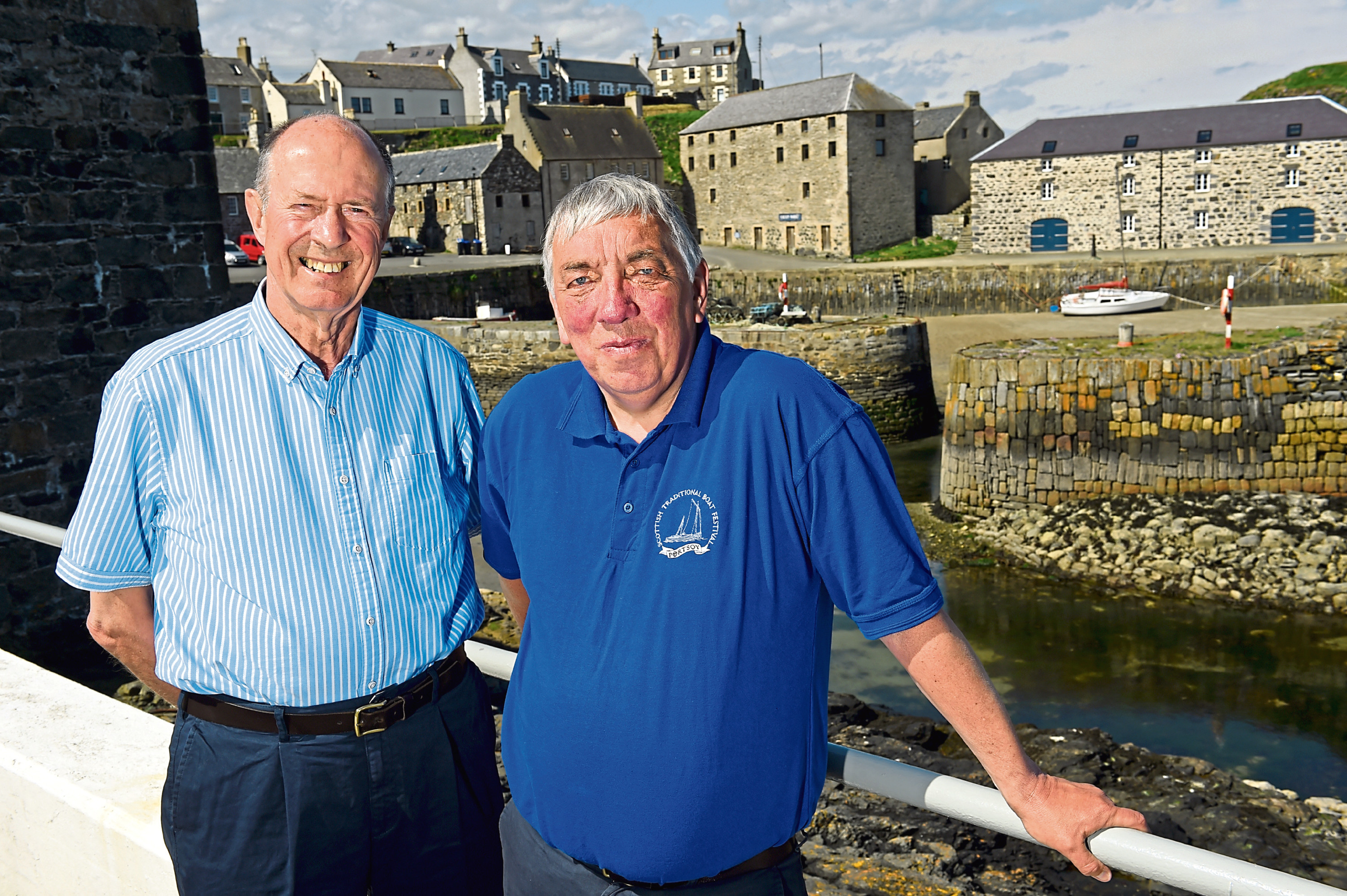 Organisers Roger Goodyear, left, and Keith Newton as Portsoy is made ready to host its 25th boat festival. Photograph by Kenny Elrick