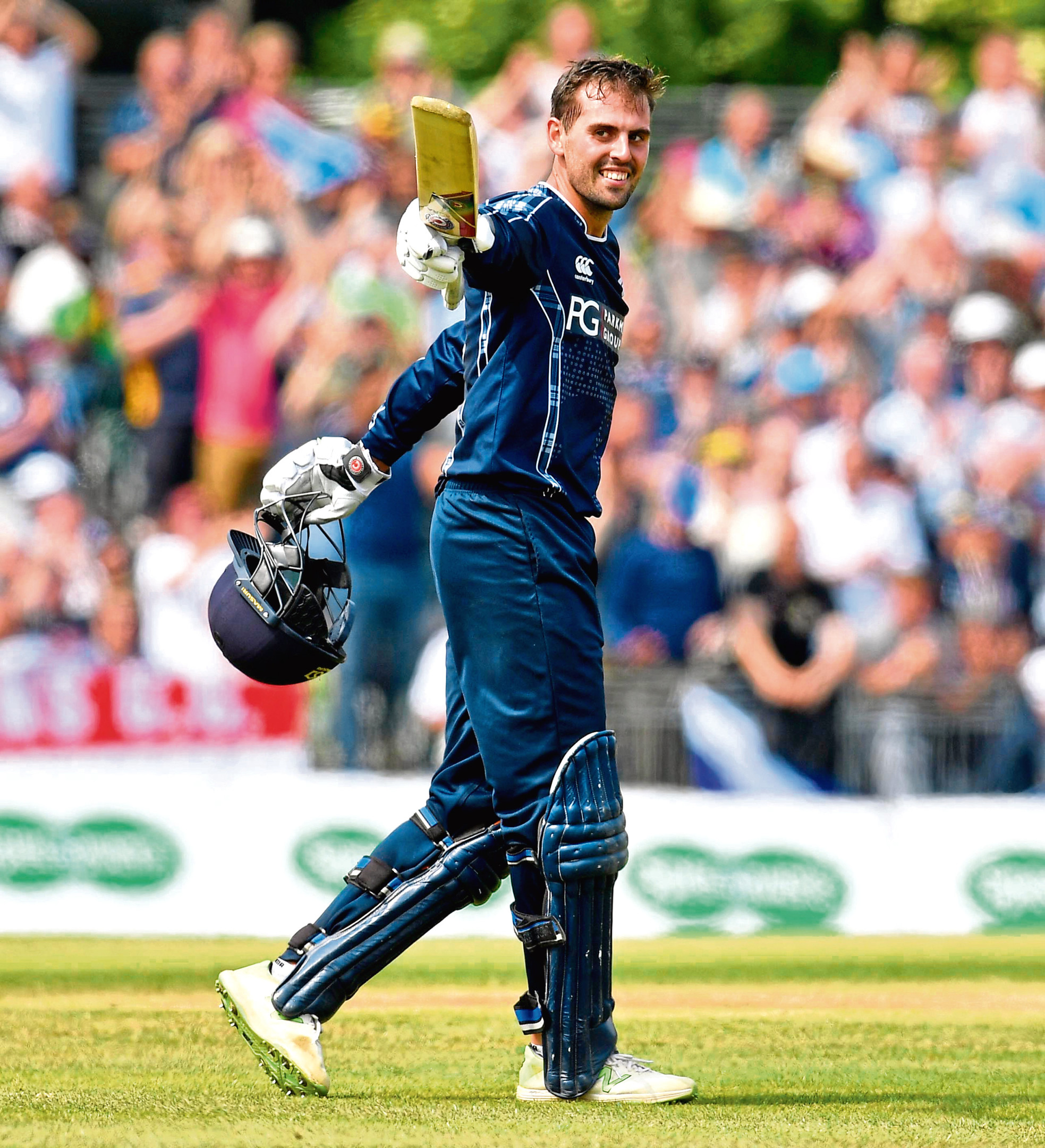 Calum MacLeod celebrates his century against England during Scotland’s historic victory at the Grange, a win that lifted the game in Scotland.