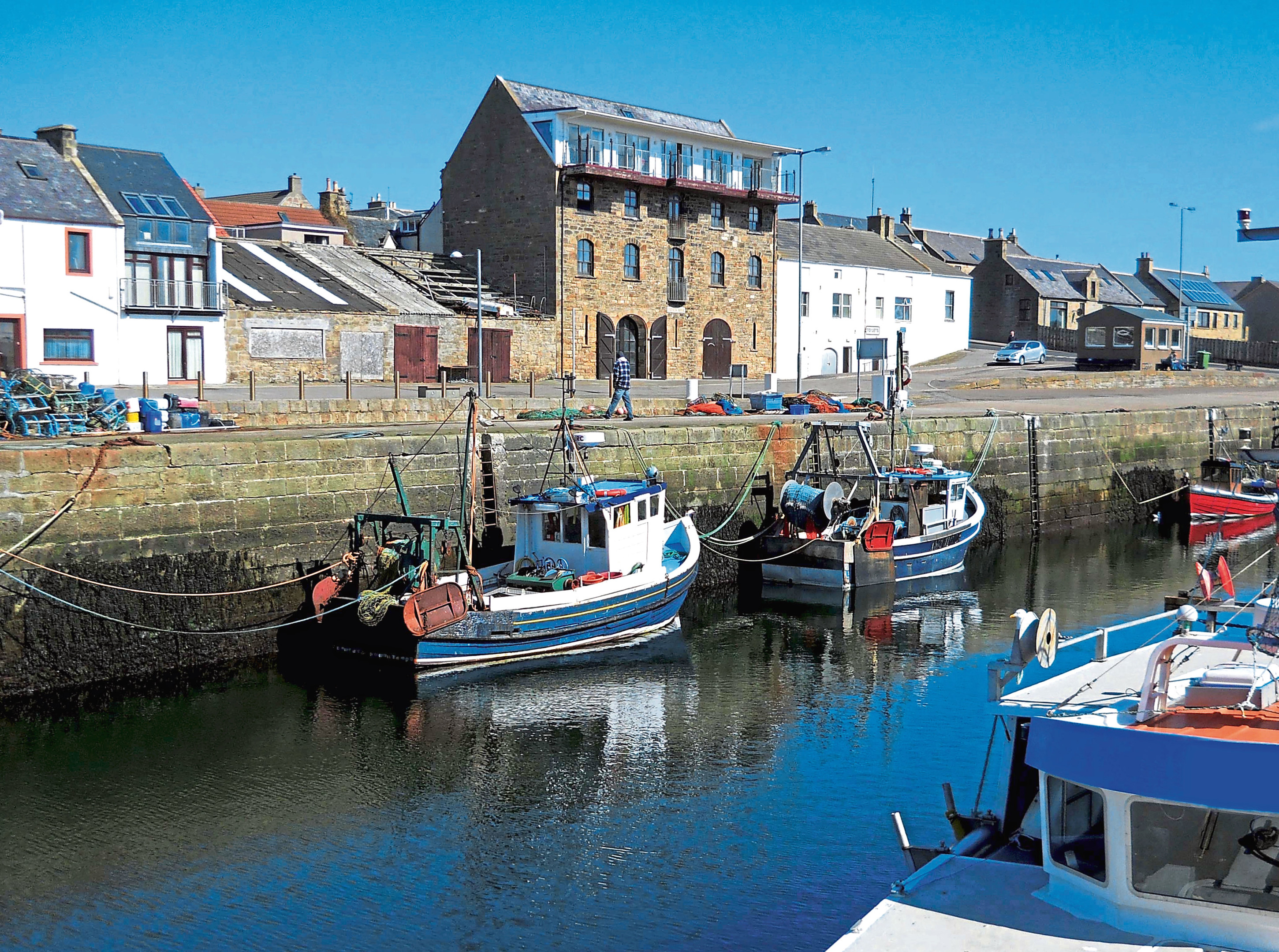 The attrative harbour in the village of Burghead near Lossiemouth on The Moray Firth on Scotland's North East Coast.