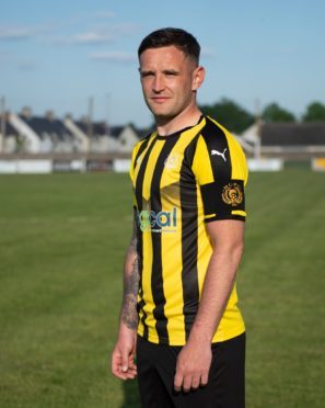 Gregg Main, pictured in Nairn County's new 2018-19 strip, will have his testimonial game at the end of the month.