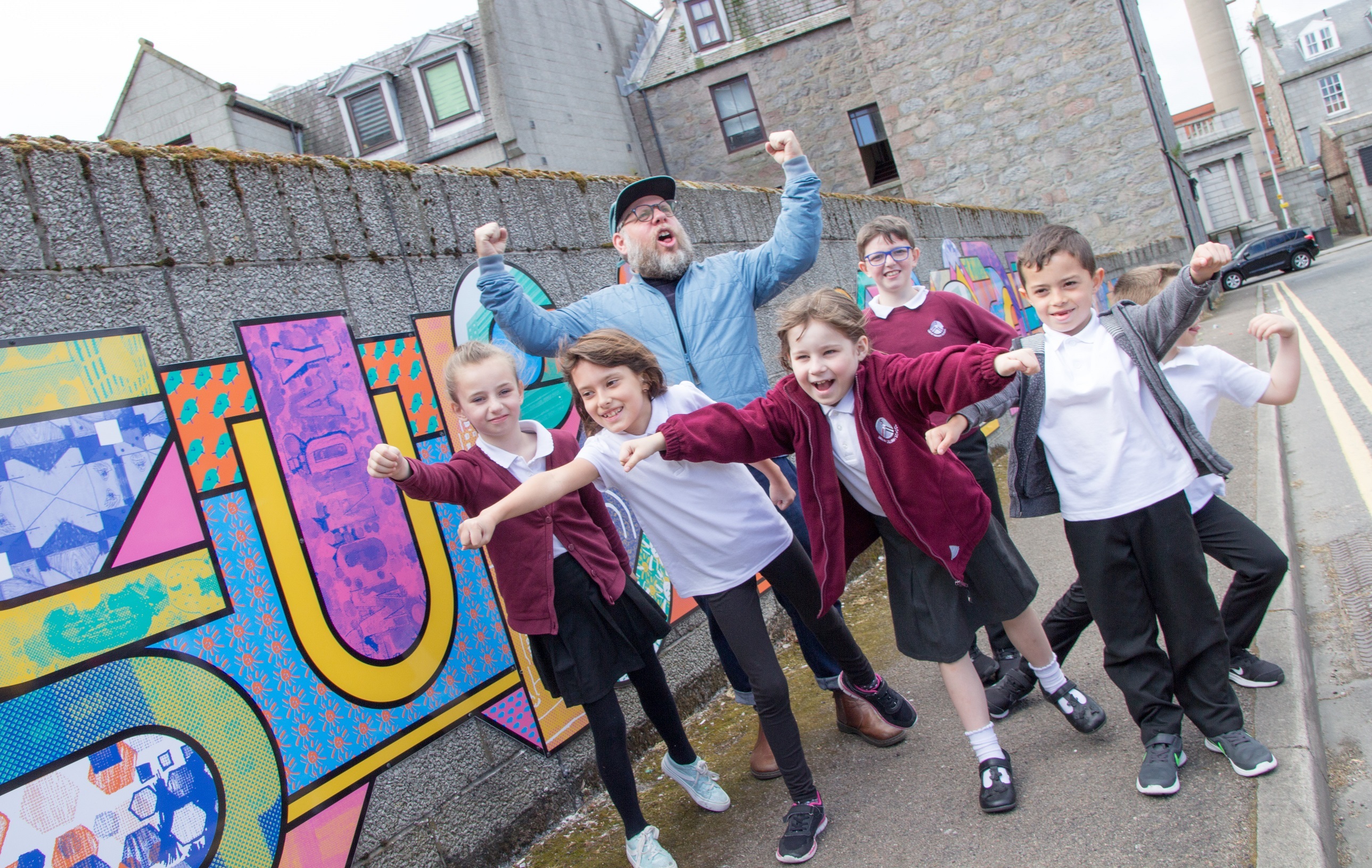 Artist Supermundane (Rob Lowe) launched the Look Again festival with the help of some local youngsters.