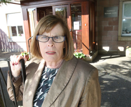 Councillor Bet McAllister outside Fairfield Nursing Home.