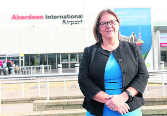 AIA Managing Director Carol Benzie outside Aberdeen International Airport