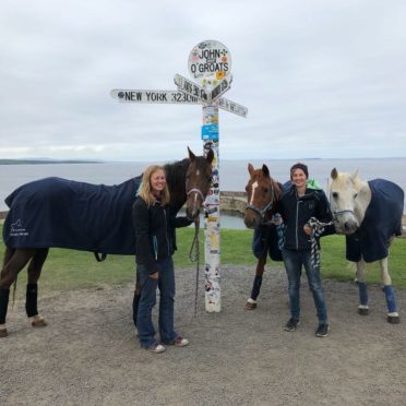 Lauren White, 26, and Meg White, 22, at John O'Groats