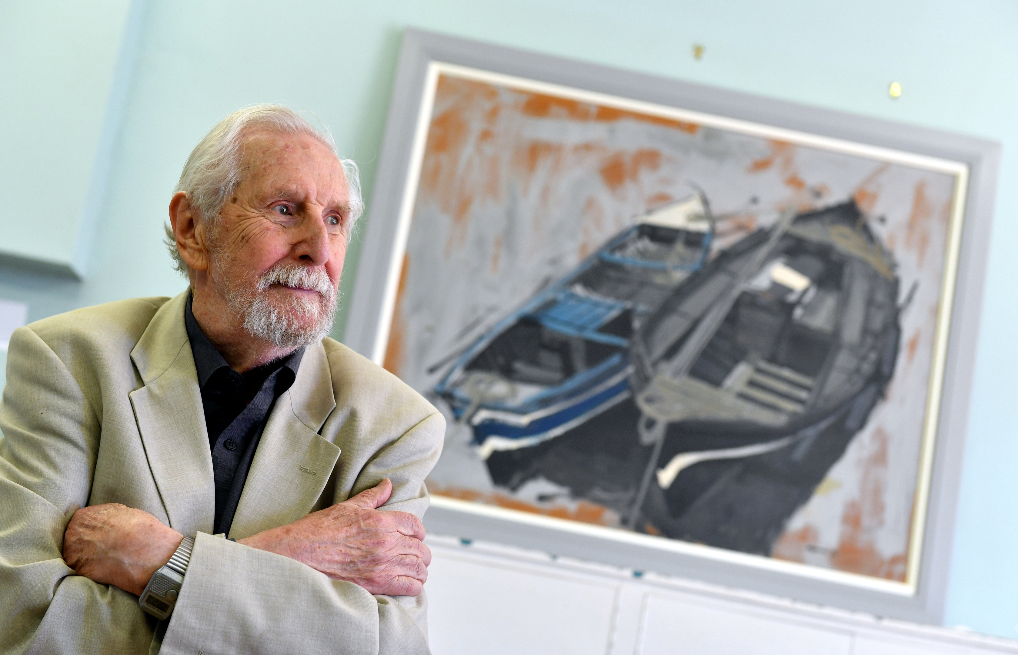 Artist James Morrison re-dedicated his fishing boat painting that has hung in Catterline School for decades.      
(Picture by Kami Thomson)