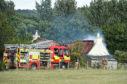 Crews were called to the cemetery in Lhanbryde.