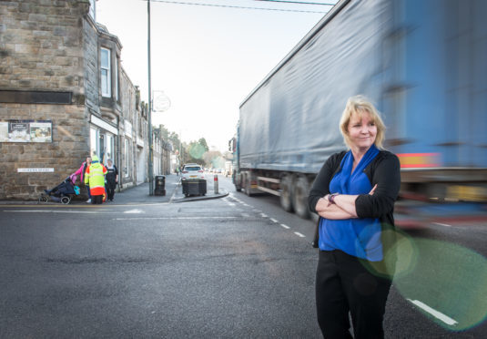 Speyside Glenlivet councillor Louise Laing inspects the lunchtime traffic in Aberlour