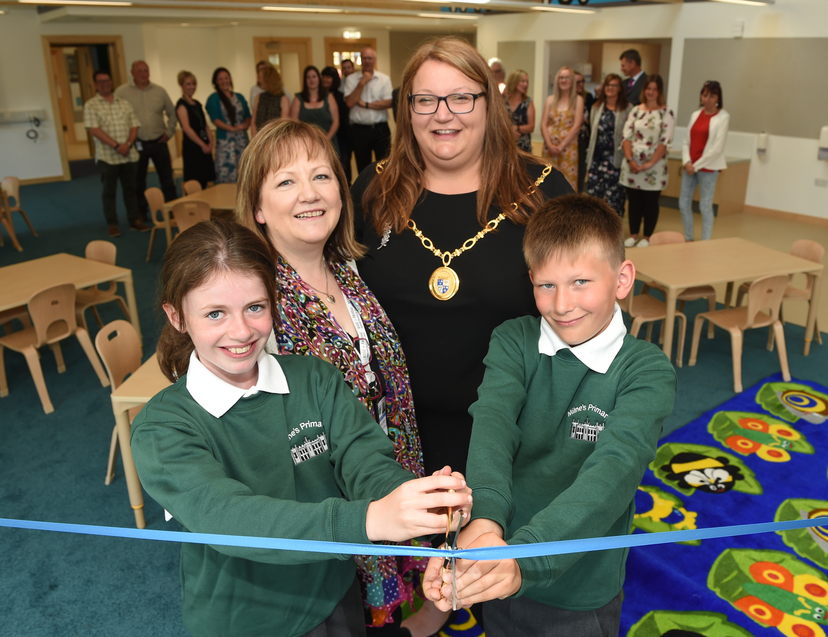Pupils at Milne’s Primary School get tour of £2million extension, which has been completed in time for last day of term.

Pictured: Hannah Stewart-Sutherland P7, Sonya Warren, chairwoman of Moray Council's children and young people services commitee, council convener Shona Morrison, P7 pupil 
Tavis Thomson.