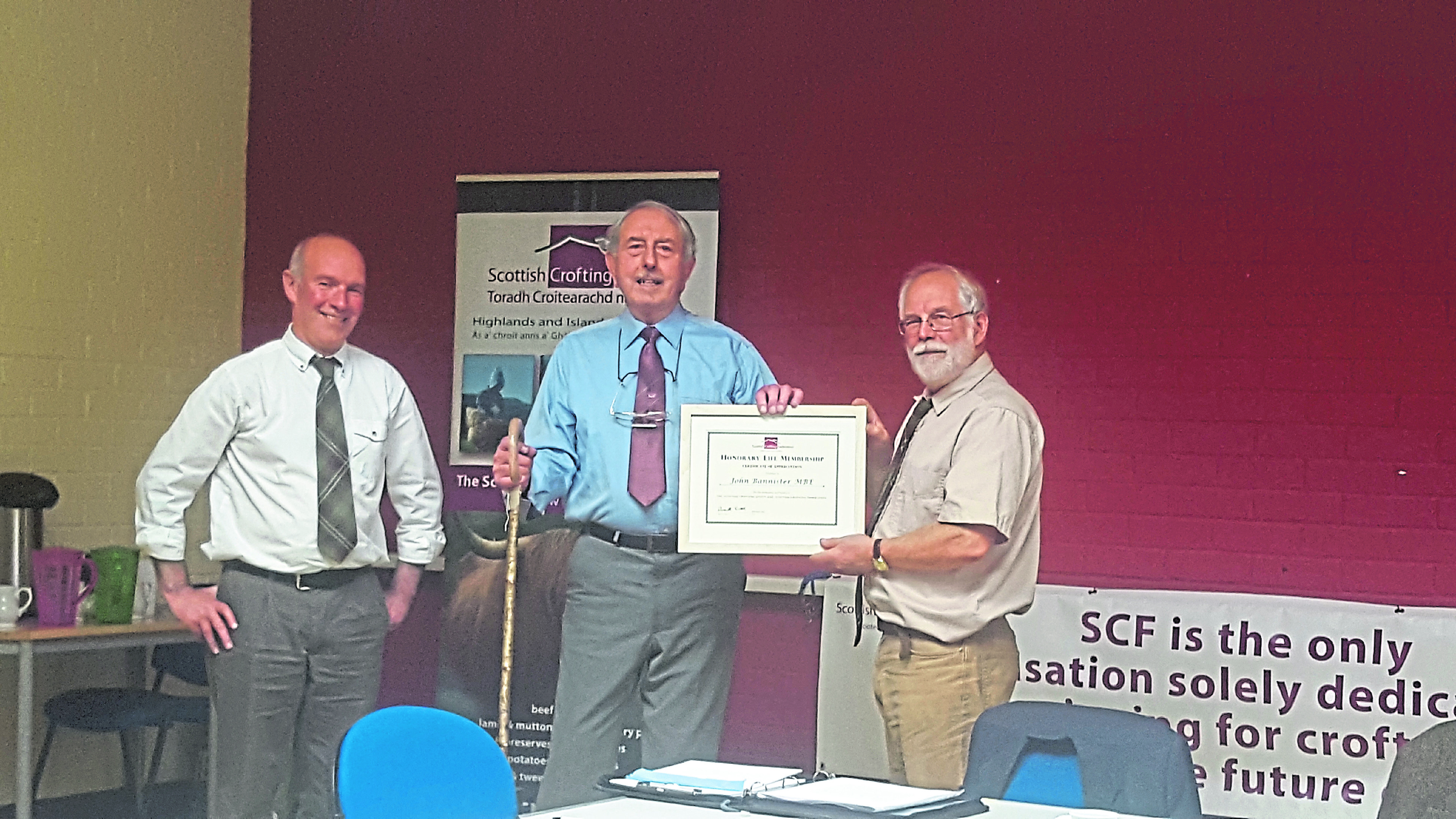 John Bannister, centre, with Scottish Crofting Federation chairman Russell Smith, right, and chief executive Patrick Krause.