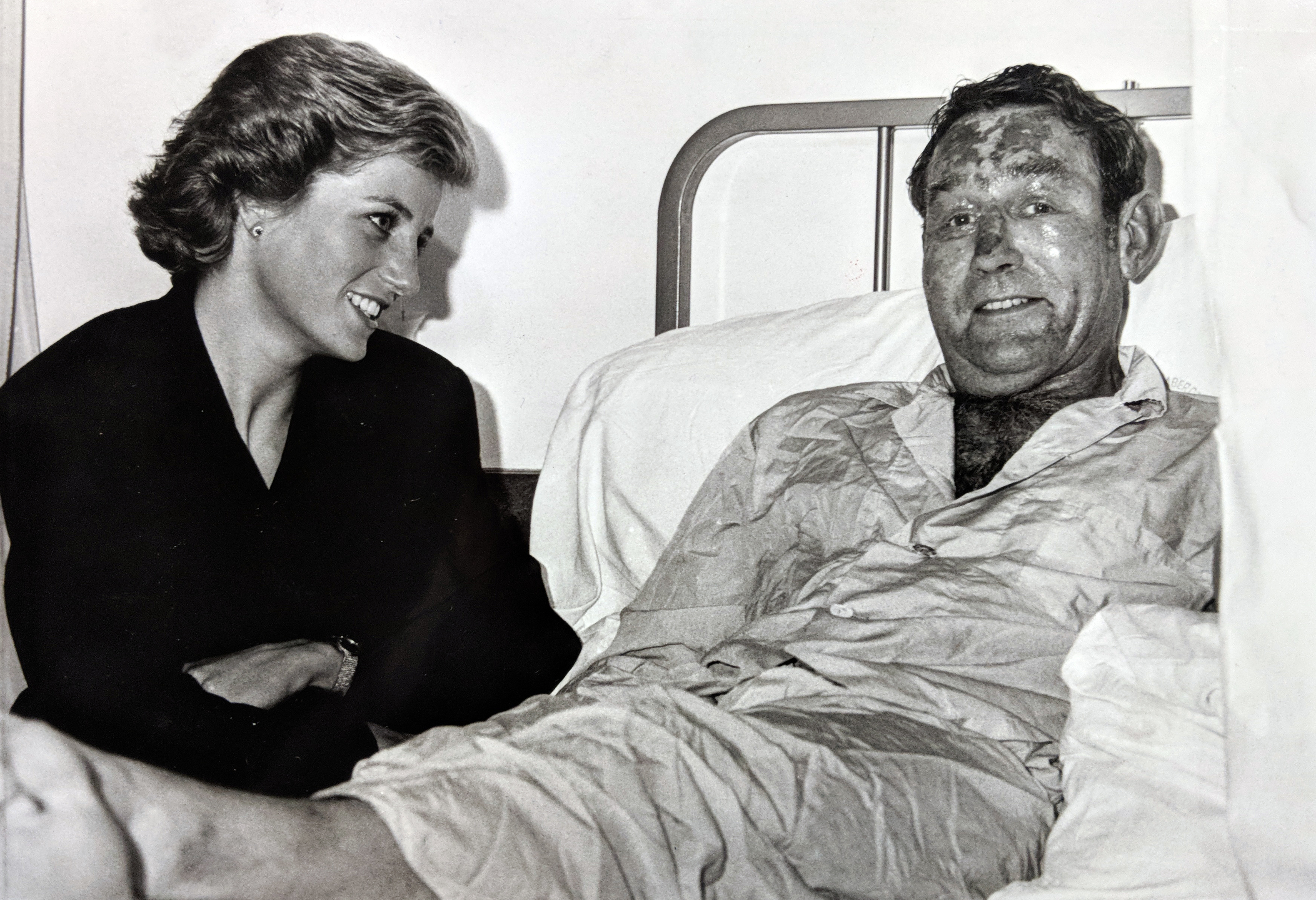 Sandy McCook's photo of Princess Diana at the bedside of survivor Michael Bradley at ARI.