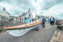 Cullen Sea School launch new skiff that has been built by Buckie High School students in a ceremony at Cullen Harbour last year.