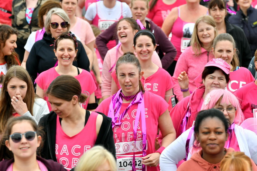 Race for Life ; 
At Aberdeen beach in aid of Cancer Research UK.     
Pictured - warm up for the 5k.   
Picture by Kami Thomson    10-06-18