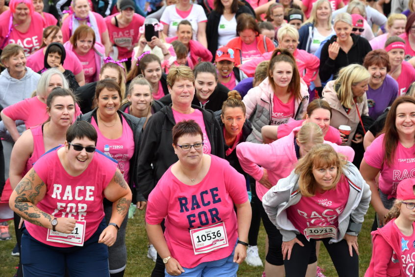 Race for Life ; 
At Aberdeen beach in aid of Cancer Research UK.     
Pictured - warm up for the 5k.   
Picture by Kami Thomson    10-06-18