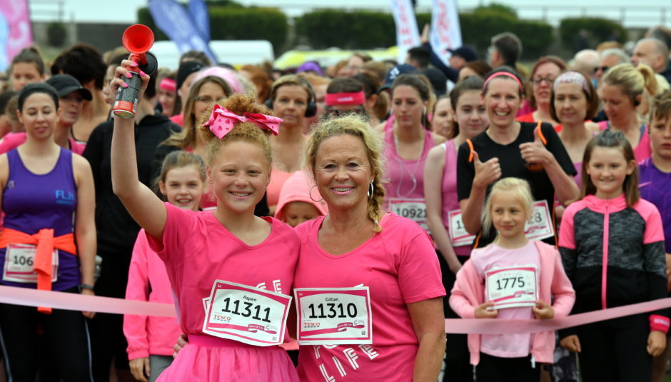 Race for Life ; 
At Aberdeen beach in aid of Cancer Research UK.     
Pictured - Gillian Bitta with her daughter Aspen who started the 5k.   
Picture by Kami Thomson    10-06-18