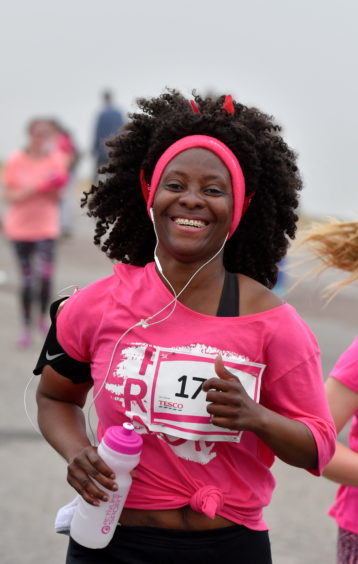 Race for Life ; 
At Aberdeen beach in aid of Cancer Research UK.     
Pictured - Prisca Zeze running in the 5k.   
Picture by Kami Thomson    10-06-18