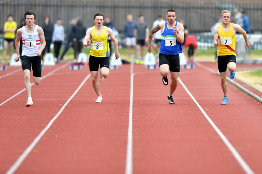 Marcus Archer and Andrew Smith (7) Inverness Harriers in the 100m sprint
