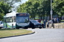 A number 59 bus and car have been involved in a collision on North Andreson Drive, Aberdeen. Pictured are police at the scene.



Picture by Scott Baxter    27062018