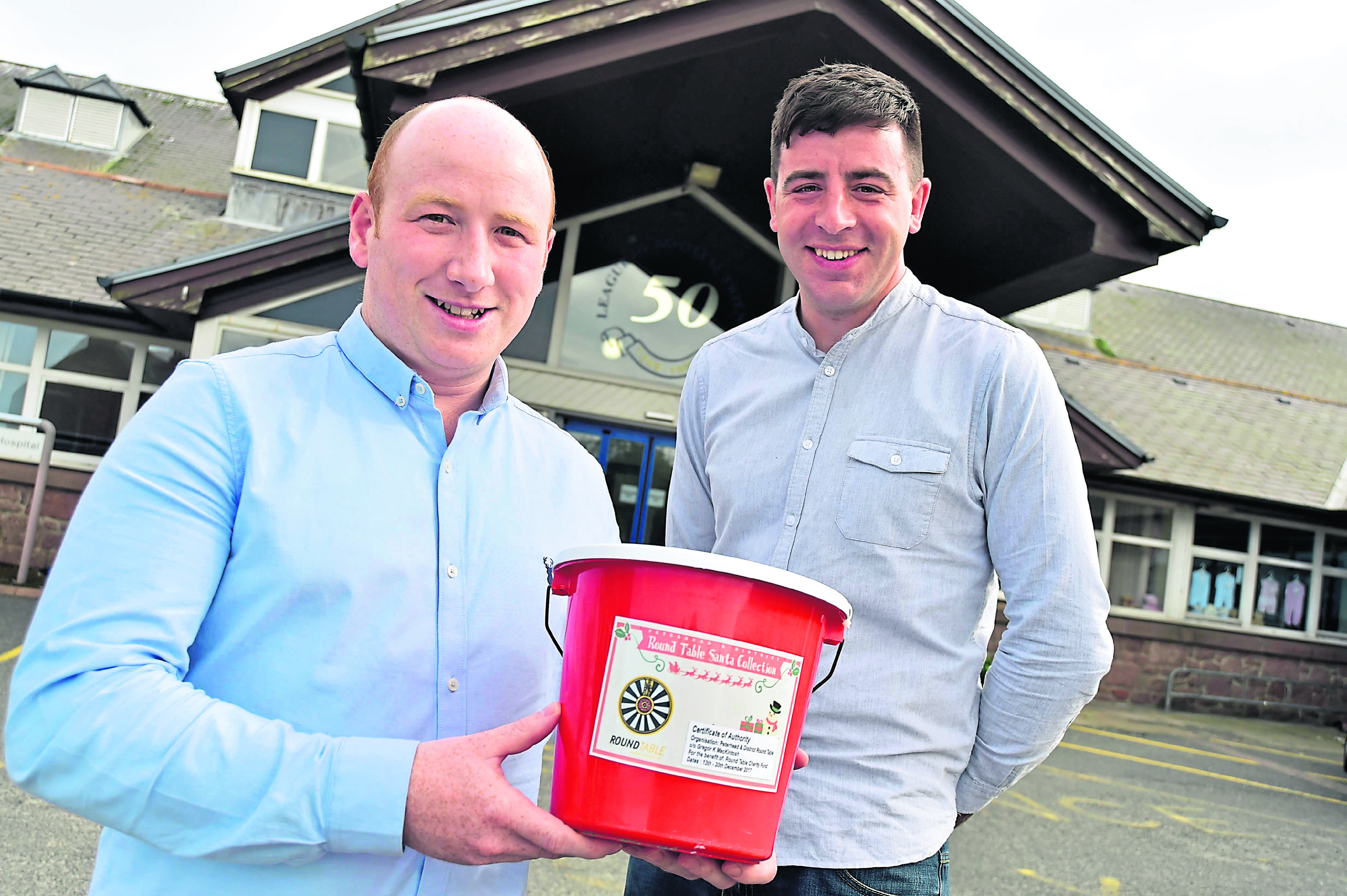 Gregor Mackintosh (L) and Scott Maskame from Peterhead Round Table at Peterhead Community Hospital.