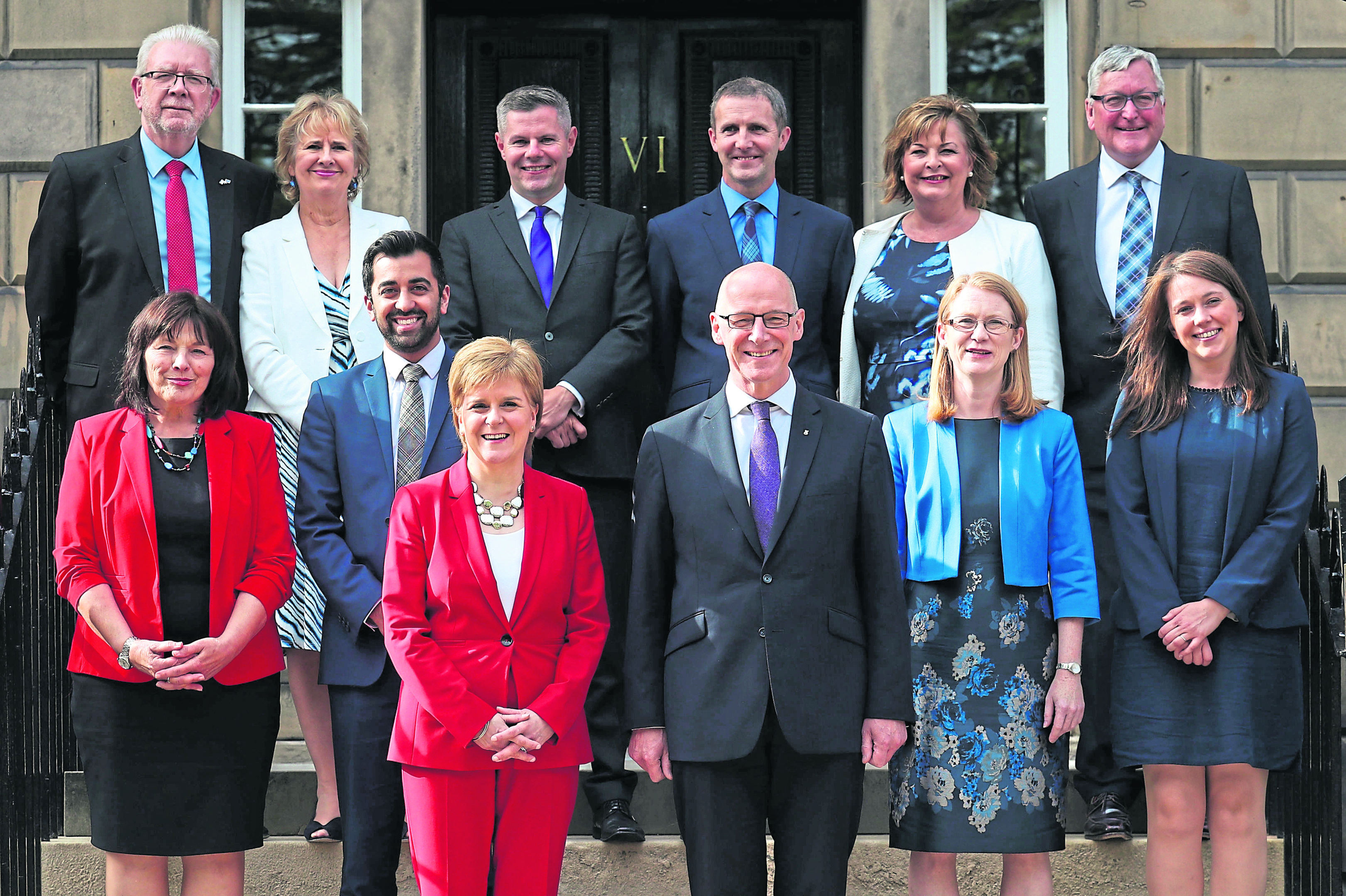 First Minister Nicola Sturgeon and Deputy First Minister John Swinney, centre right, with, back row, from left, Mike Russell, Roseanna Cunningham, Derek Mackay, Michael Matheson, Fiona Hyslop, Fergus Ewing, centre row, from left, Jeane Freeman, Humza Yousaf, Shirley-Anne Somerville and Aileen Campbell