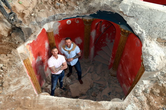 Paul Gibson and Dean Smart surveying the crypt inside the former Masonic Lodge on Western Road, Aberdeen.