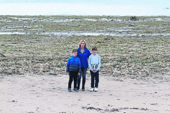 Councillor Julie MacKenzie at Ganavan with her sons Daniel 9 and Sean 12.