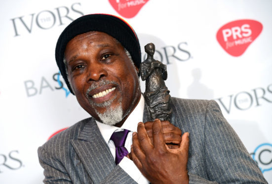 Billy Ocean with the award for International Achievement at the 63rd Annual Ivor Novello Songwriting Awards.