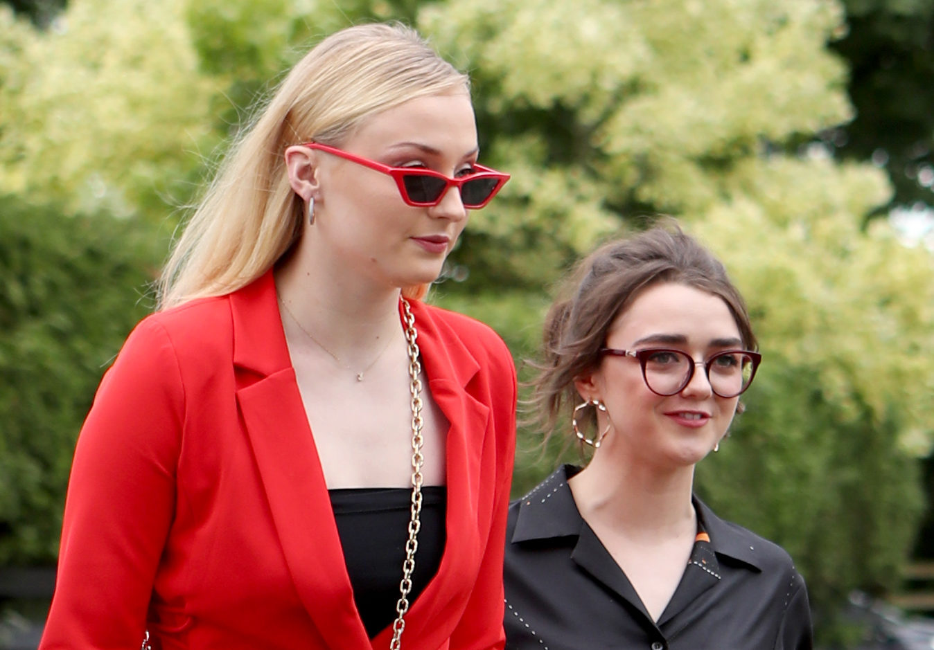 Actresses Sophie Turner (left) and Maisie Williams arrive at the wedding (Jane Barlow/PA Wire)