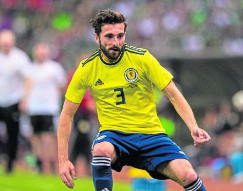 Graeme Shinnie in action for Scotland against Mexico.