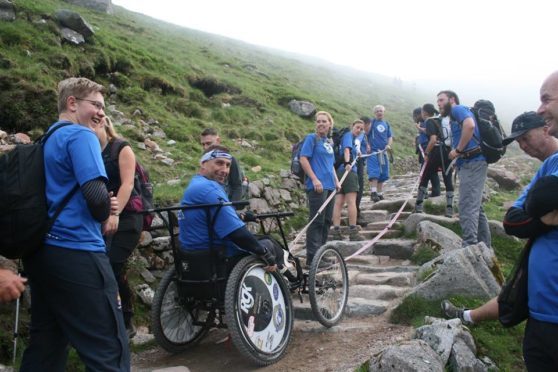 Shaun Gash during the climb. Credit Jeremy Duxbury