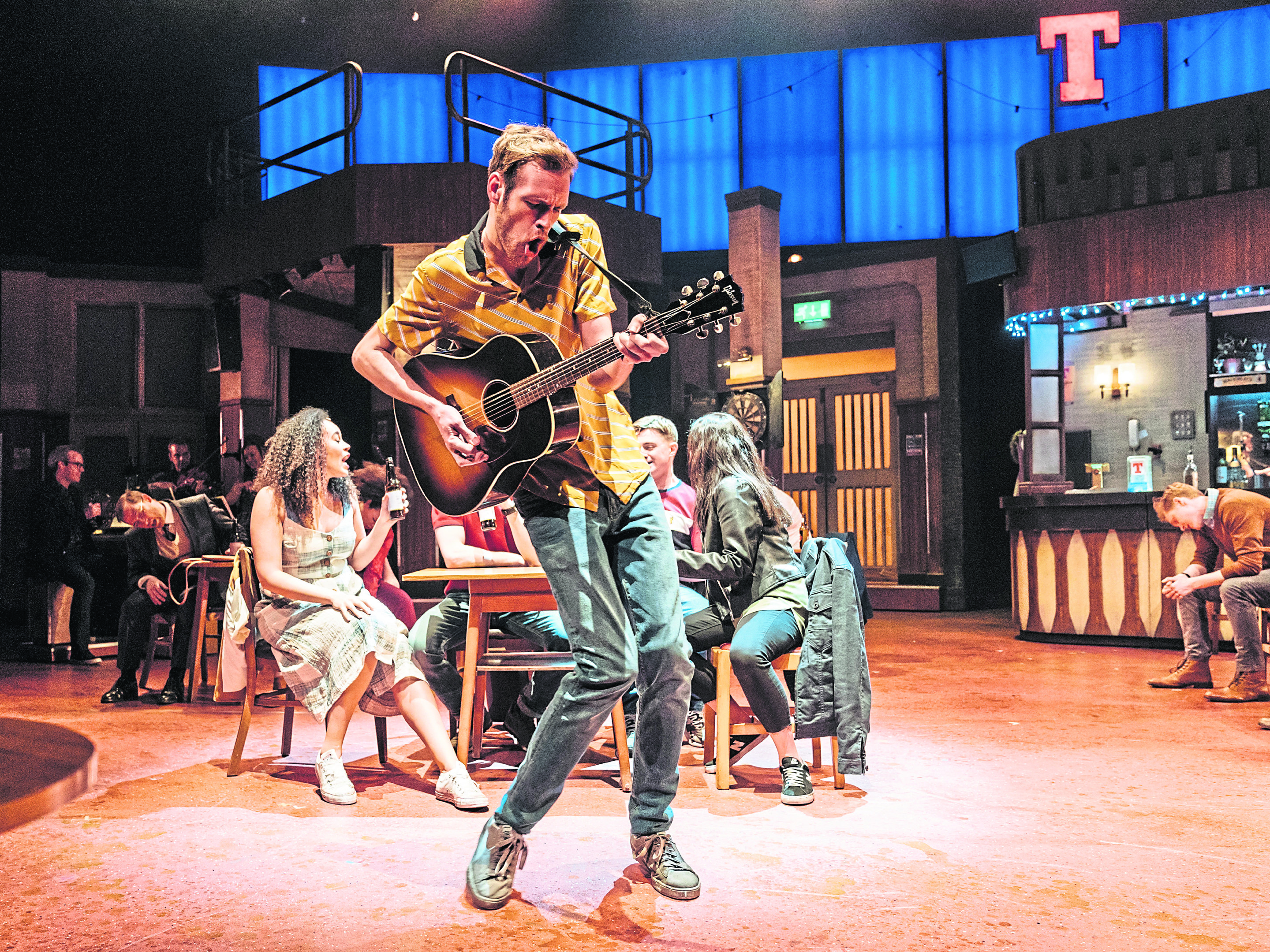 Tyler Collins rocks it up with the ensemble cast. The musical’s themes are love, home and identity