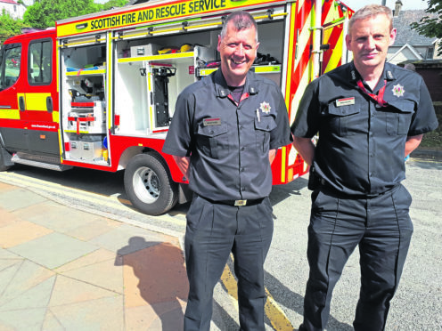 Fire officers Ian Nicholson, left, and Mike Colliar with one of the new RRUs which are lighter than traditional fire appliances