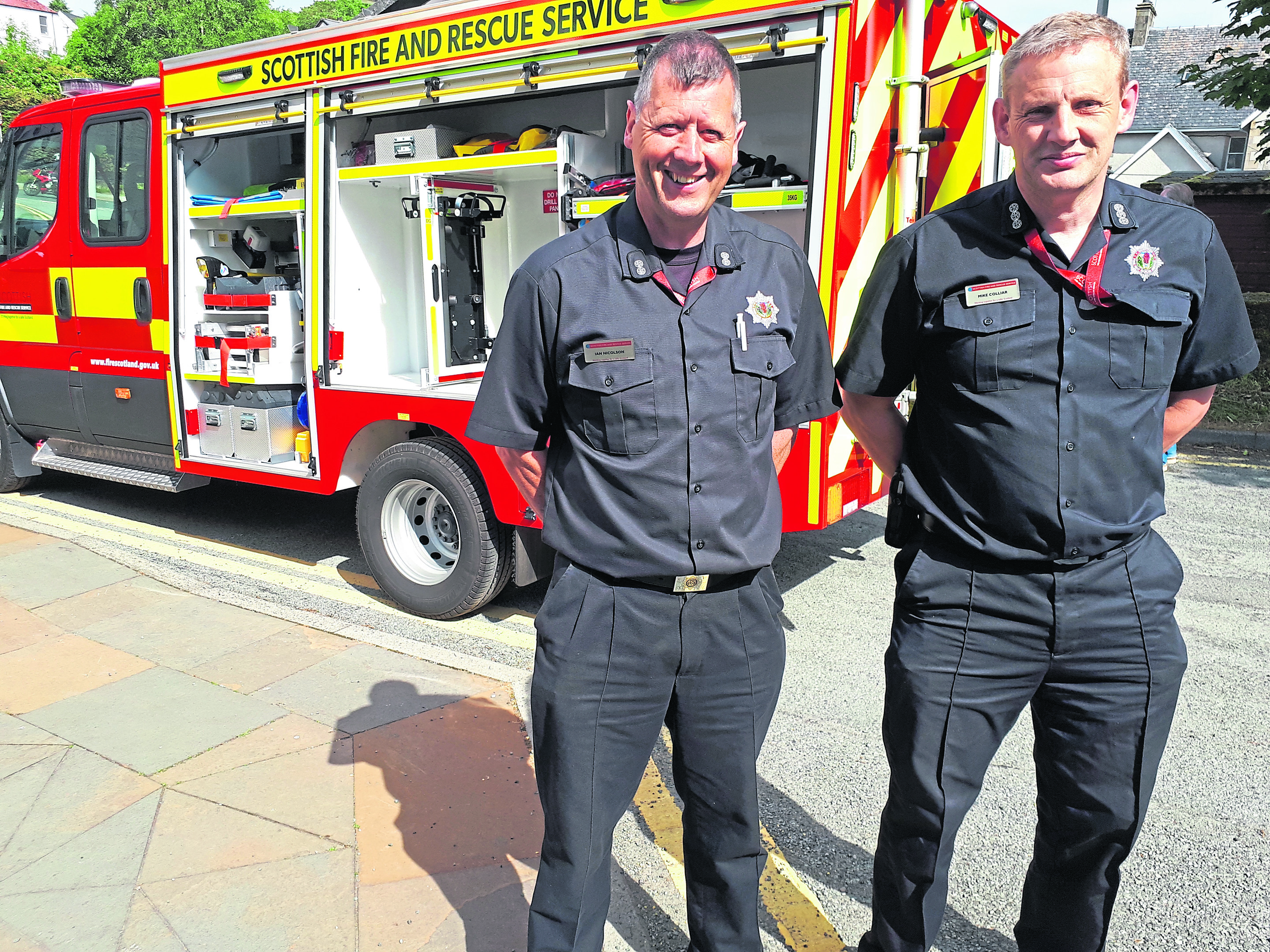 Fire officers Ian Nicholson, left, and Mike Colliar with one of the new RRUs which are lighter than traditional fire appliances