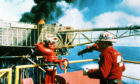 Texan oil well firefighter Red Adair orchestrated the operation to 'kill' Piper Alpha's burning wells.