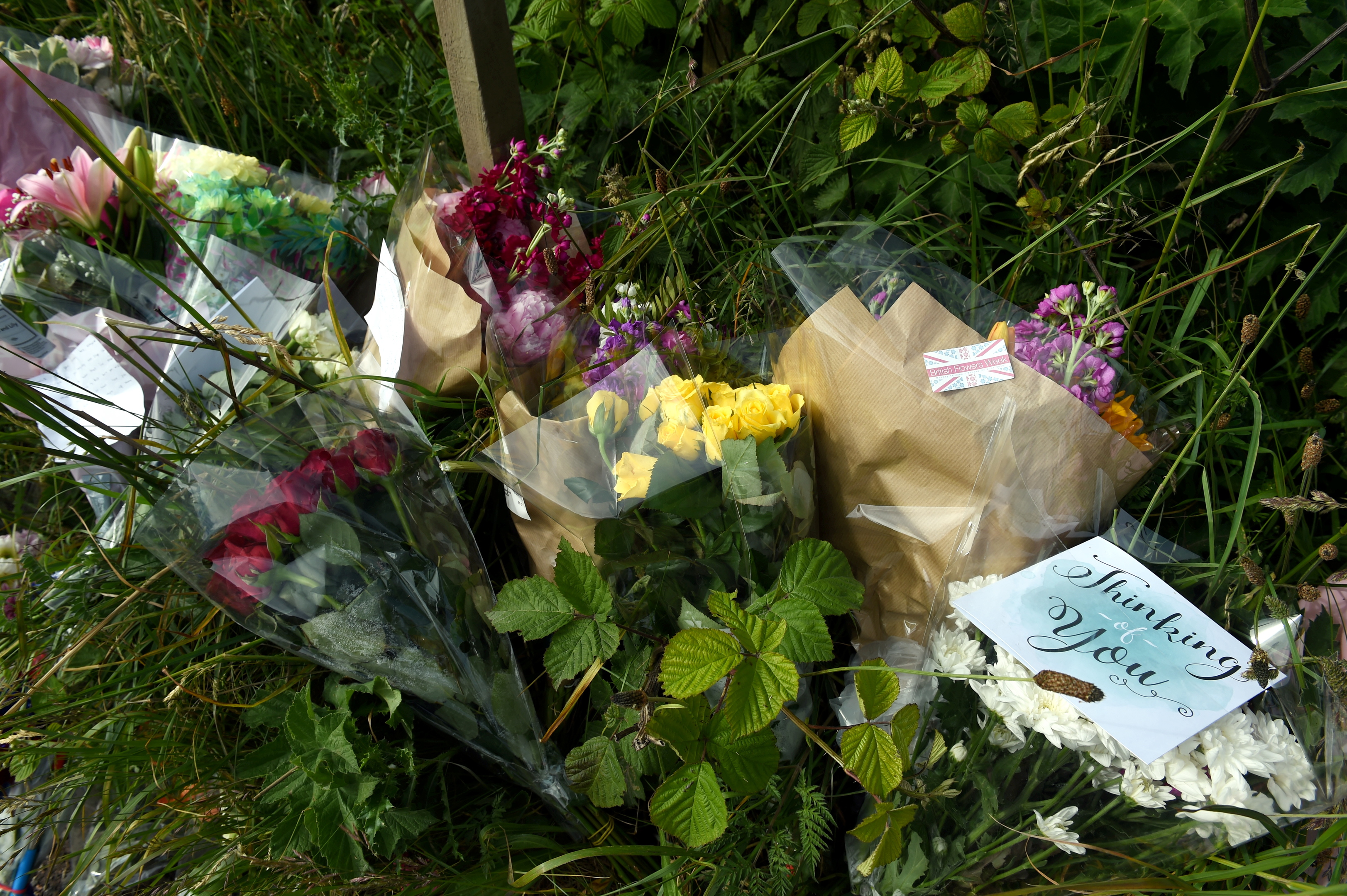 Flowers left at the scene of a dead 14-year-old boy near Hillside School. Portlethen.