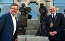 Sculptor David Williams-Ellis and Lord Provost Barney Crockett in front of Aberdeen's fishing memorial at the Maritime Museum. Picture by Jim Irvine