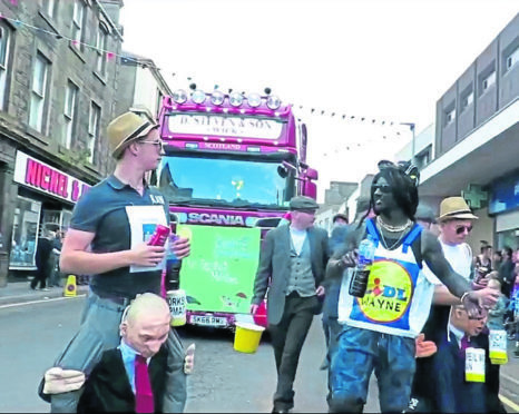 A man dressed up as "Lidl Wayne" at Wick gala.