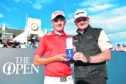 Sam Locke shows off his Silver Medal to former Open champion Paul Lawrie