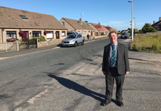 Peterhead South and Cruden councillor Stephen Calder at Baylands Crescent.